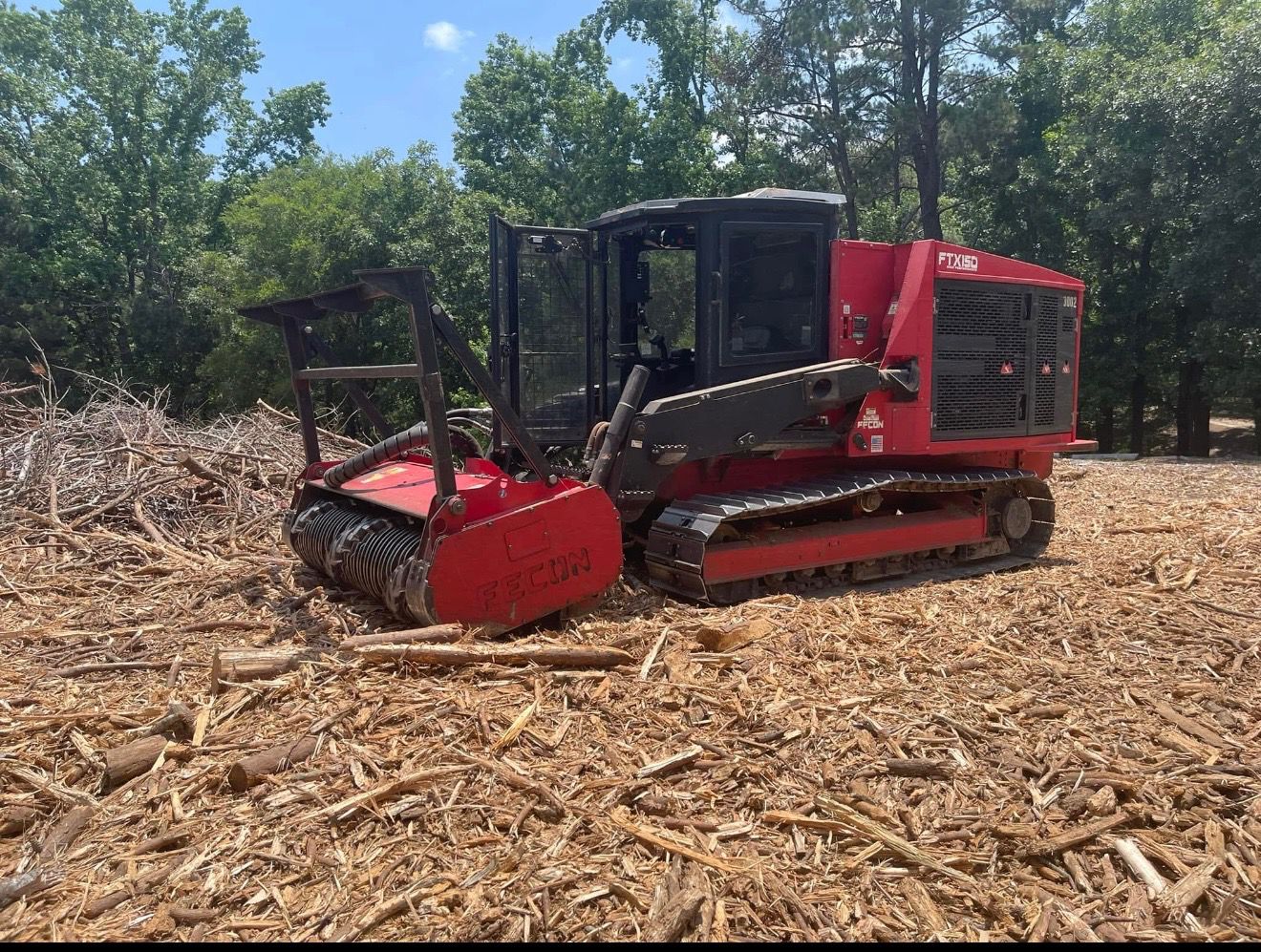 Forestry mulcher clearing ground on a job site in the Texarkana area