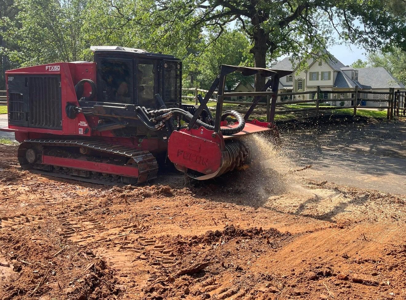 Track-mounted forestry mulcher on freshly cleared land